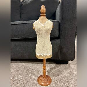 Mini decorative dress form. Wood base. Painted paper form . 21” tall.